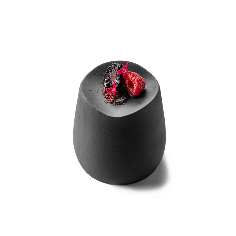 Matte black porcelain podium plate, luxury modern tableware for elevated, dramatic gourmet presentation and artistic plating