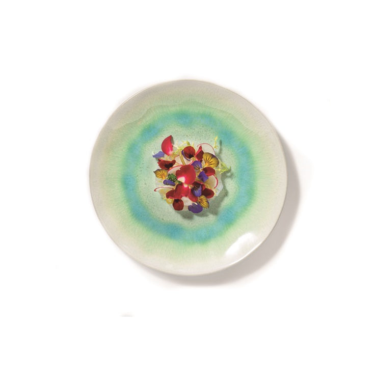 Formentera stoneware plate with coastal green-blue glaze and wave texture, perfect for appetizers or main dishes.