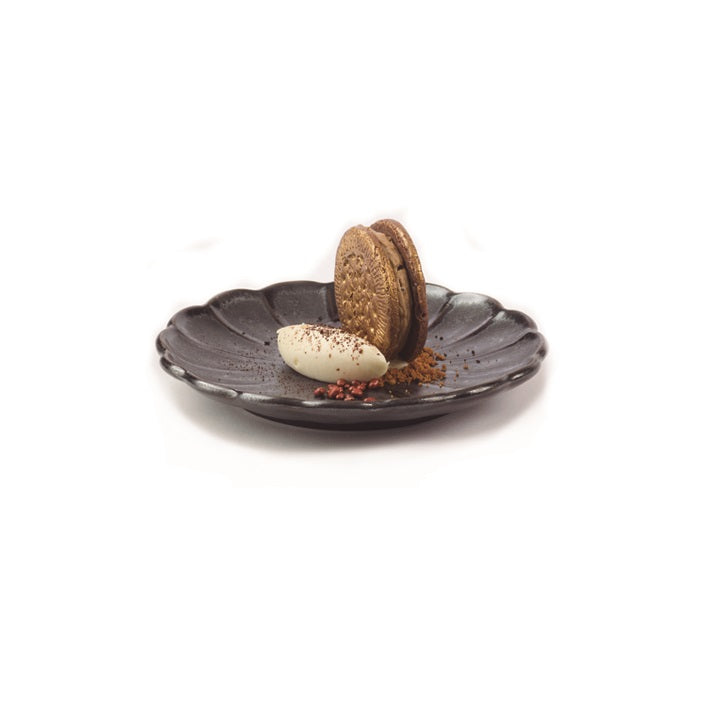 16cm black stoneware Dalia plate with petal edges, textured finish, elegant serveware for appetizers, desserts, or small portions.