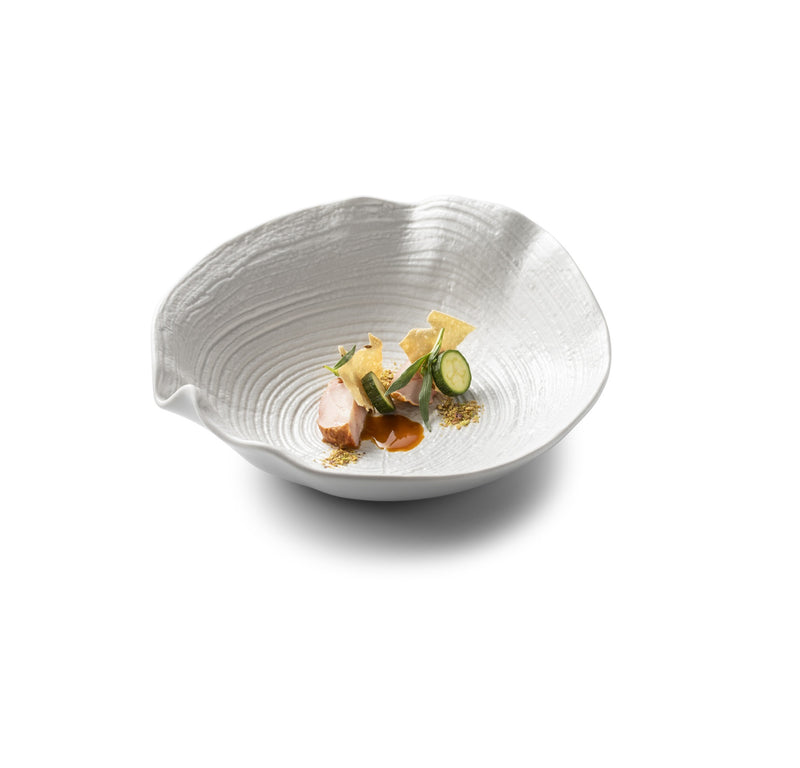 Artistic matte porcelain bowl with tree-ring design, perfect for luxury plating of soups, desserts, or refined culinary presentations.