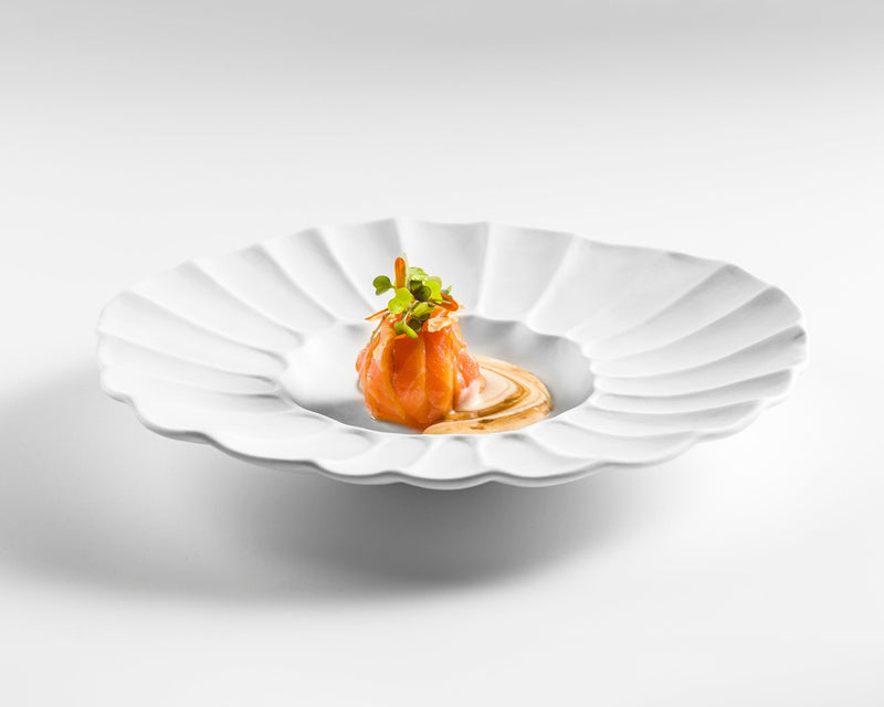 Lira deep plate in matte white porcelain with sculpted fluted design, luxury tableware for modern artistic fine dining