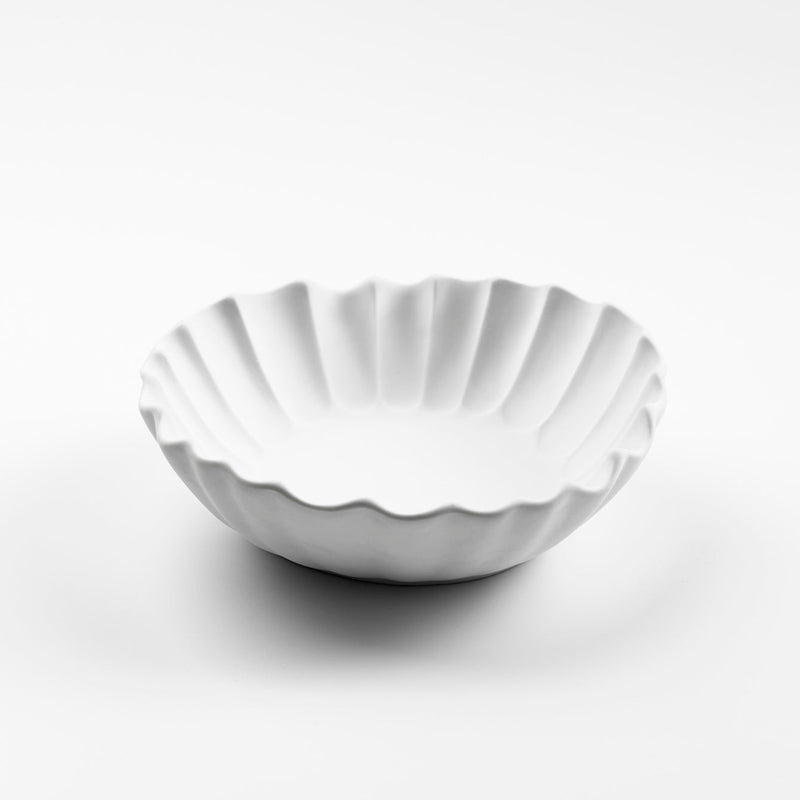 Lira matte porcelain bowl with fluted edges, artistic luxury tableware for modern dining and elegant food presentation
