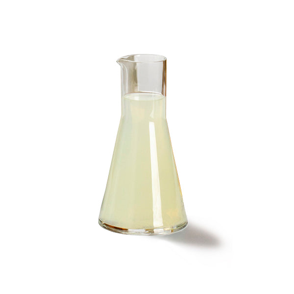 Glass jug with tapered design and glossy finish, heat/dishwasher/freezer safe, luxury buffet tableware, elegant and durable serveware.