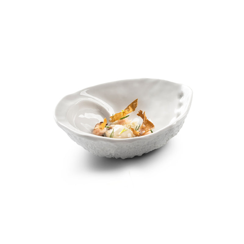 Porcelain bowl with gloss/matte finish, sea-inspired, textured, luxury, artistic design from Pordamsa's Mediterranean line.