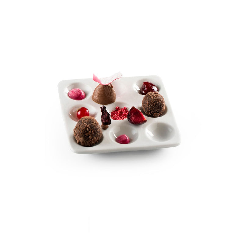 Luxury porcelain degustation tray with artistic matte-gloss finish; hive-inspired design ideal for elegant, creative food plating.