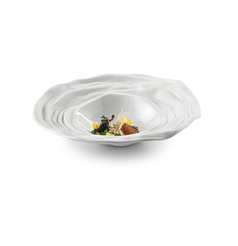 Luxury porcelain deep plate with artistic wave design, matte-gloss finish, inspired by Barcelona’s modernist style.