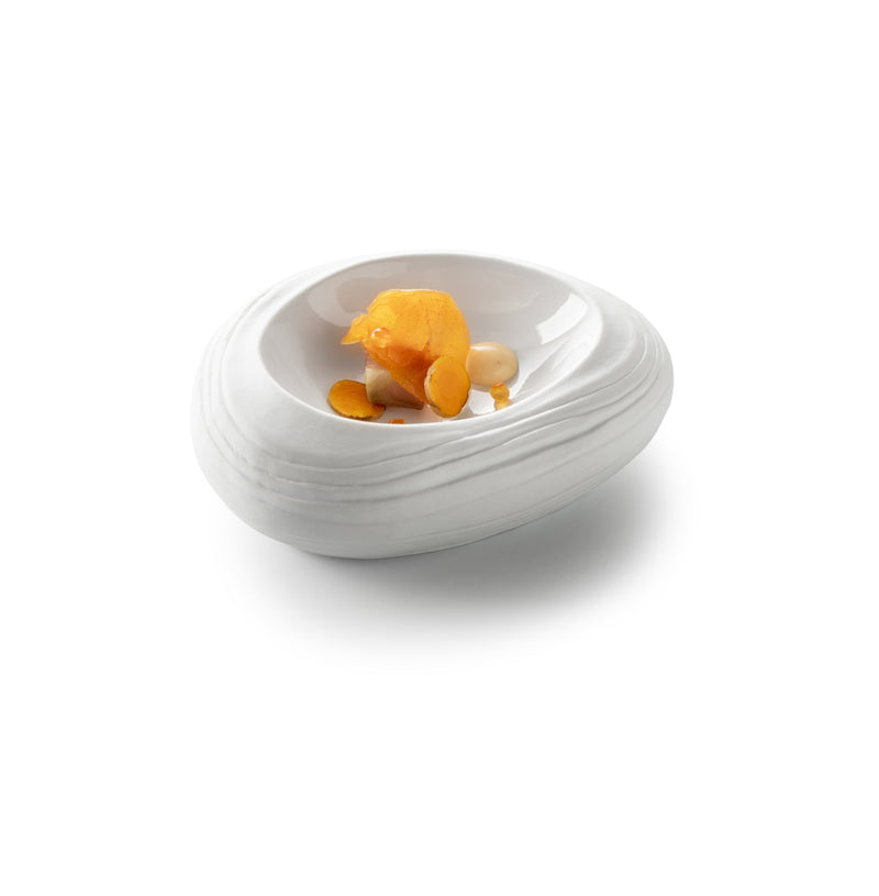 Artistic porcelain bowl with matte-gloss finish, inspired by Barcelona's coastal curves; perfect for luxury food presentation.