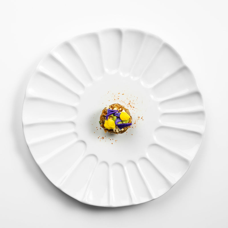 Lira plate in glossy white porcelain with sculpted fluted design, luxury artistic tableware for refined fine dining