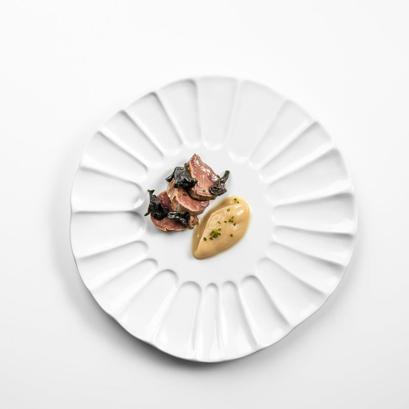 Lira plate in glossy white porcelain with sculpted fluted design, luxury artistic tableware for refined fine dining