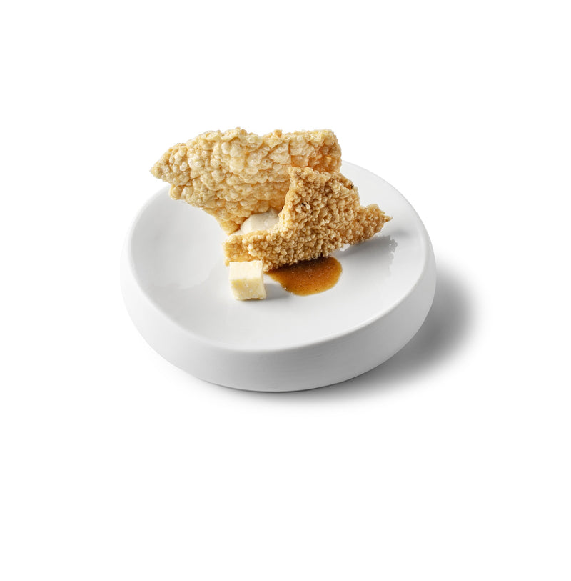 Luxury handmade matte porcelain plate, desert-inspired design, elegant artistic tableware for fine dining and gourmet presentation