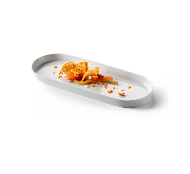 Luxury porcelain oval serving tray with glossy finish, elongated design, microwave, oven, freezer & dishwasher safe, artistic Nordic tableware for appetizers and desserts.