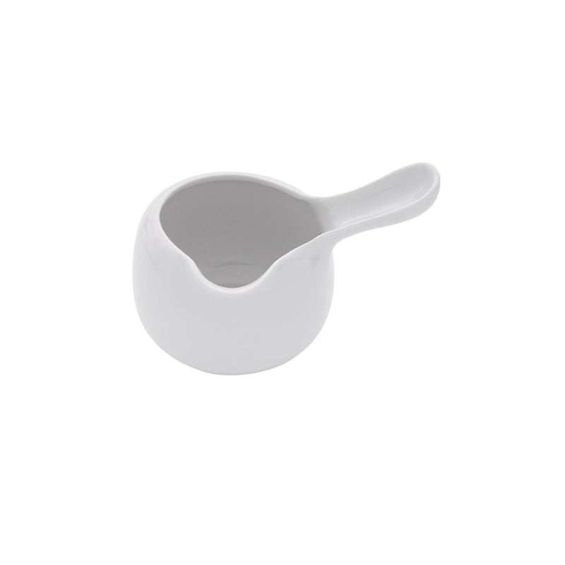 Classic porcelain mini jug with glossy finish, ideal for cream or sauces, luxury serveware with elegant and functional design.