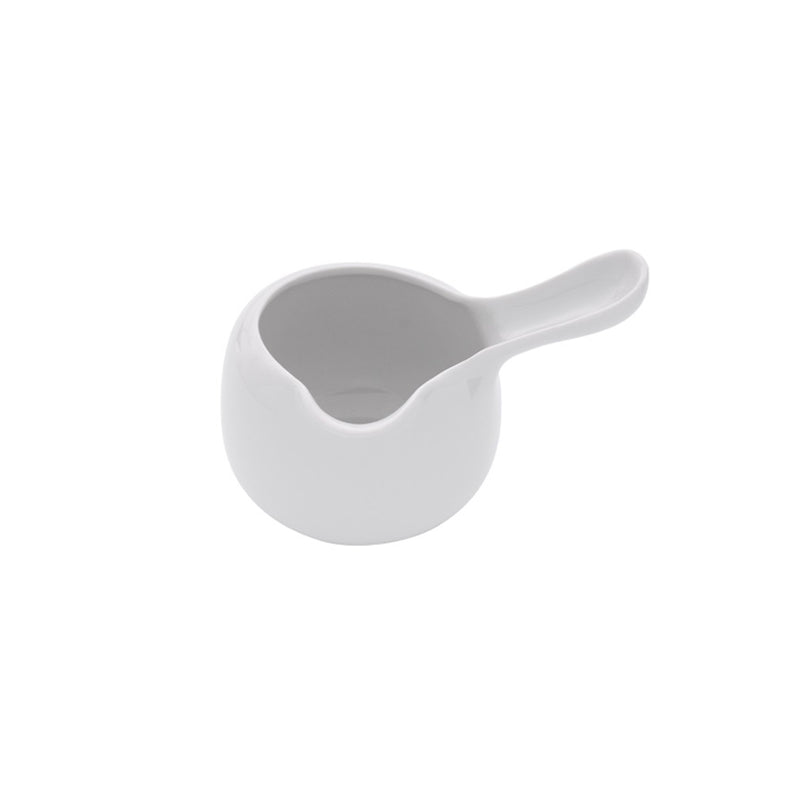 Classic porcelain jug with glossy finish, elegant round design, perfect for sauces or dressings, luxury serveware.