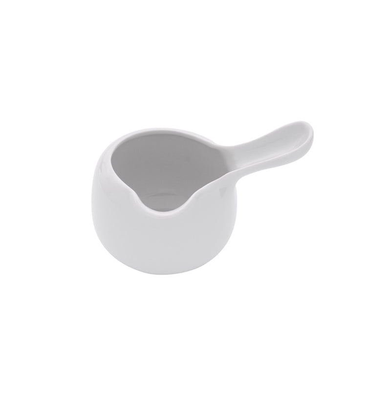 Classic porcelain jug with glossy finish, modern rounded design, perfect for sauces or beverages, luxury serveware.