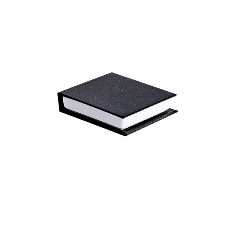 Black bill holder with sleek finish, durable design for elegant check presentation in upscale restaurants.