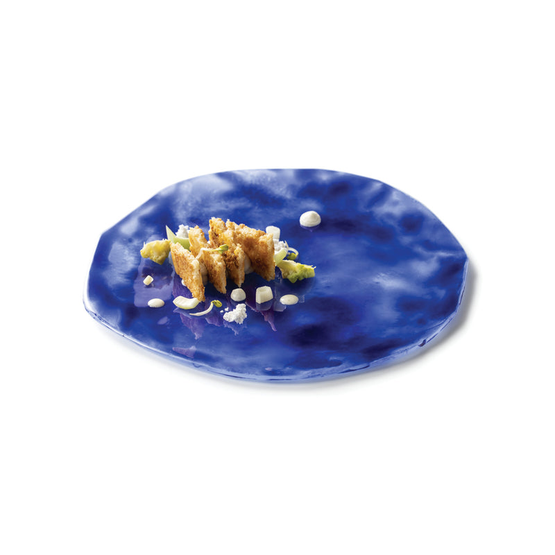 Indigo Glass Collection, handcrafted luxury tableware with deep blue hues, artistic glassware for elegant dining and decor
