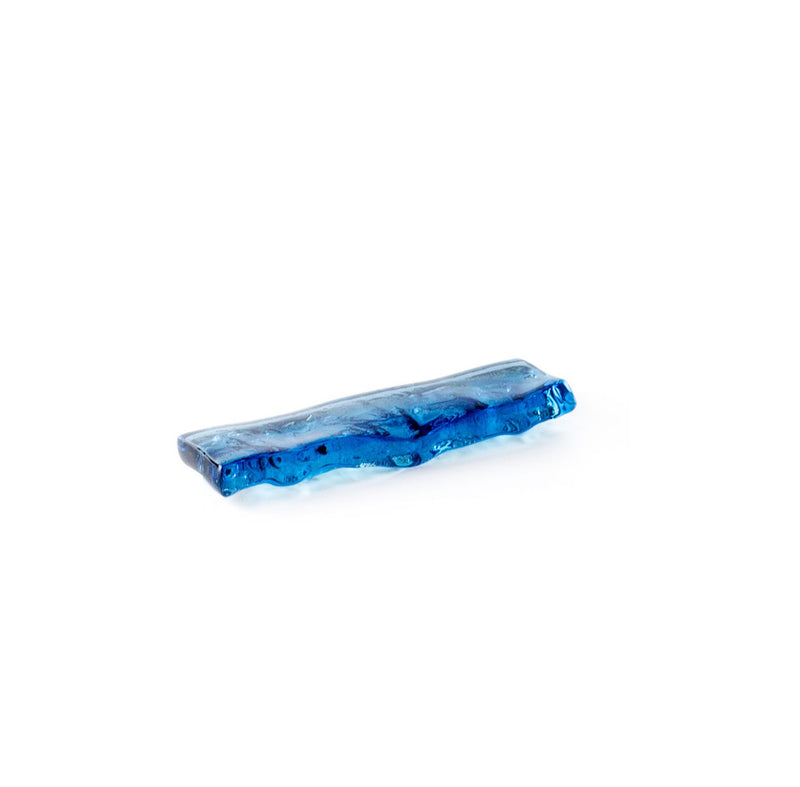 Elegant blue craft glass cutlery rest with a glossy finish, handmade for luxury dining settings and artistic table presentation.