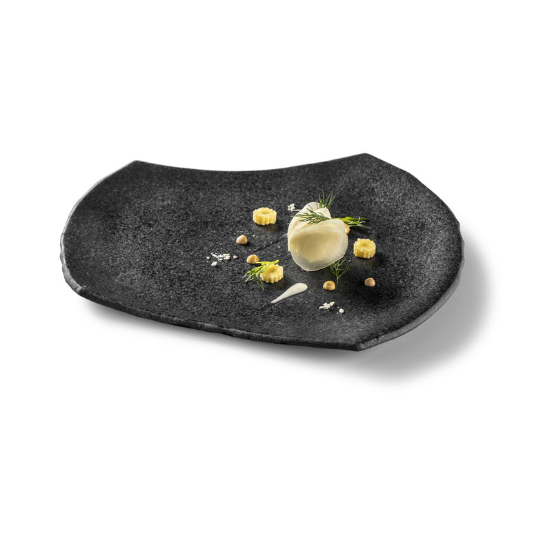 Artistic asymmetric glass plate with matte finish; luxury dining piece for bold, creative plating and modern culinary presentation.