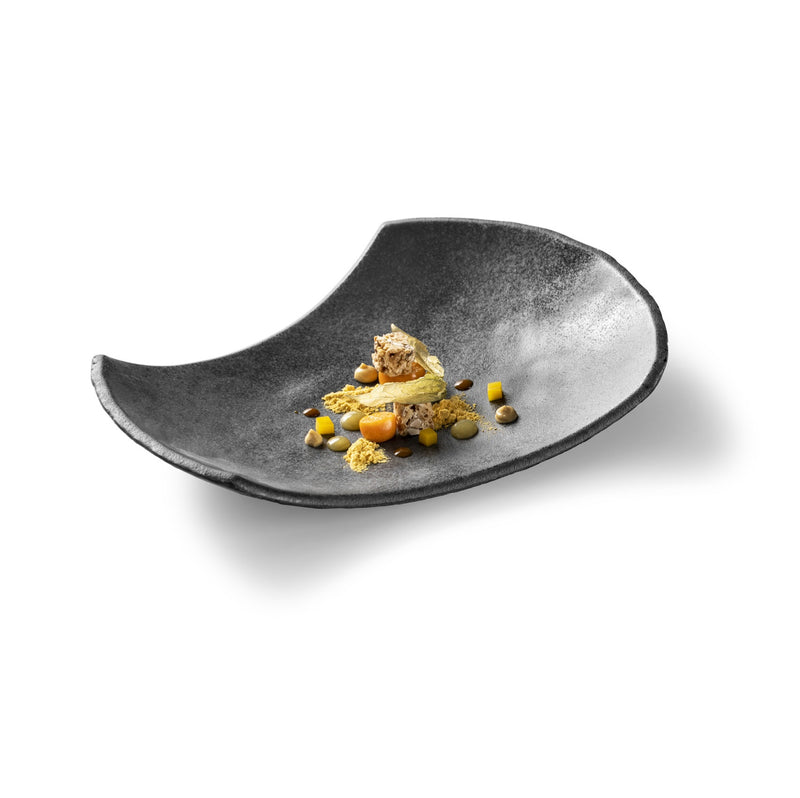 Artistic deep glass plate with matte finish and slanted design; luxury tableware for bold plating, heat, freezer, and dishwasher safe.