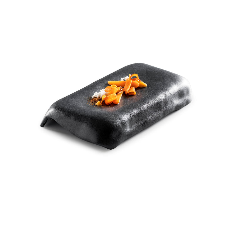 Luxury glass podium with matte black finish, handcrafted and elevated for artistic plating and chef-driven food presentation.