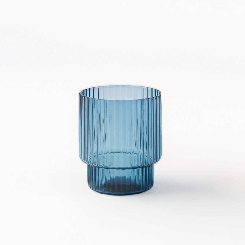 Gatsby Blue Glass 360ml with deep blue hue and ribbed texture, elegant luxury drinkware for cocktails and water