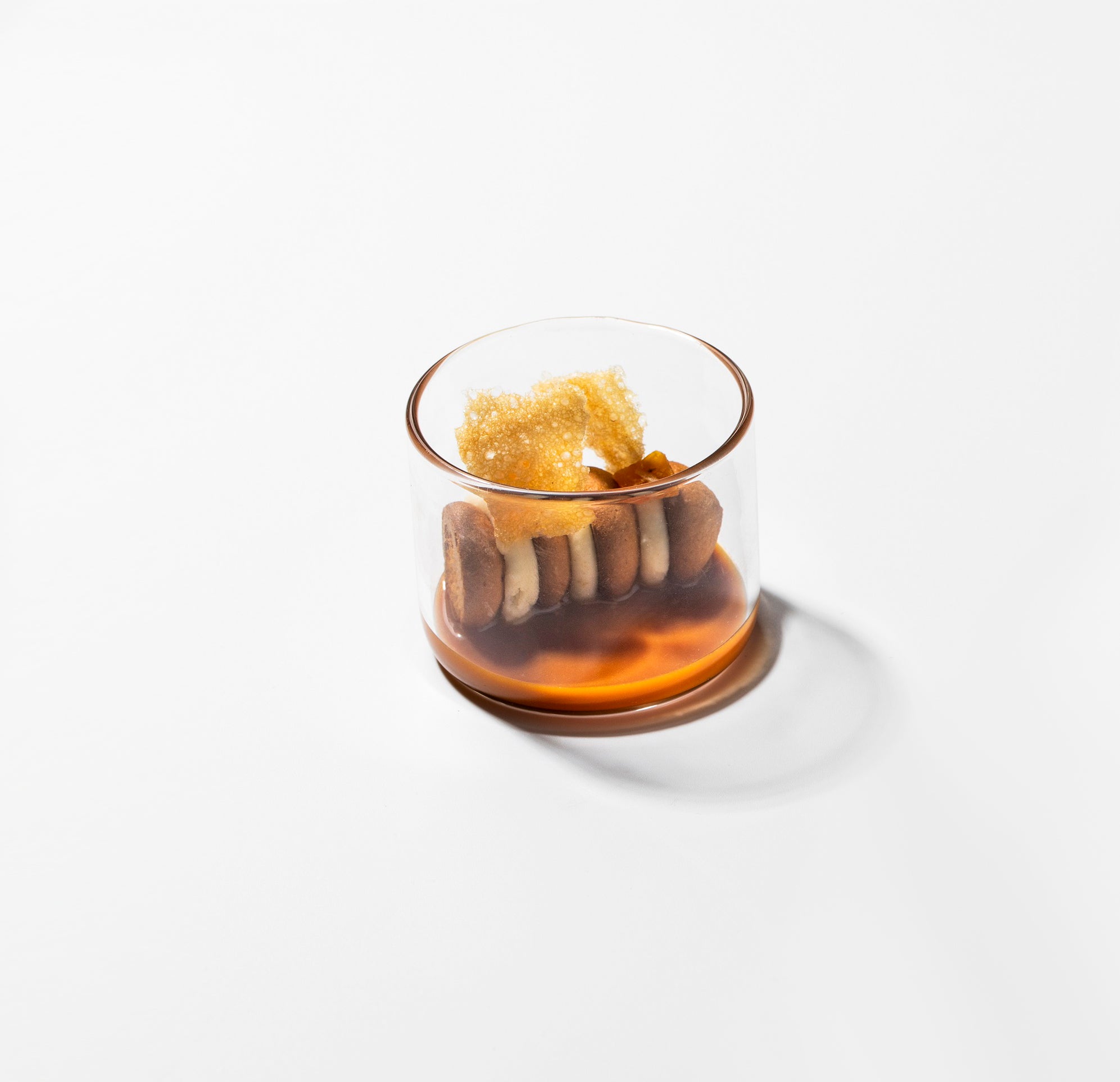 Borosilicate glass cup with polished gloss finish, heat-safe, dishwasher-safe, elegant and durable drinkware.